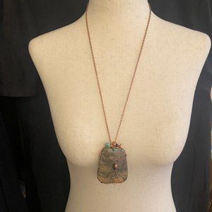 Pendant necklace with copper color chain